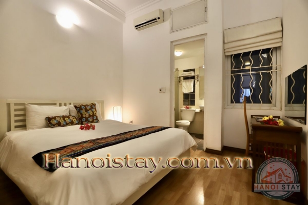 Cho thuê căn hộ 1PN Triệu Việt Vương, Hai Bà Trưng, tiện nghi, thoải mái, với nội thất có màu sáng, dịu nhẹ 3